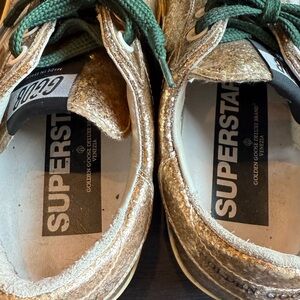 Golden Goose Superstar Gold Sneakers with Green Accents